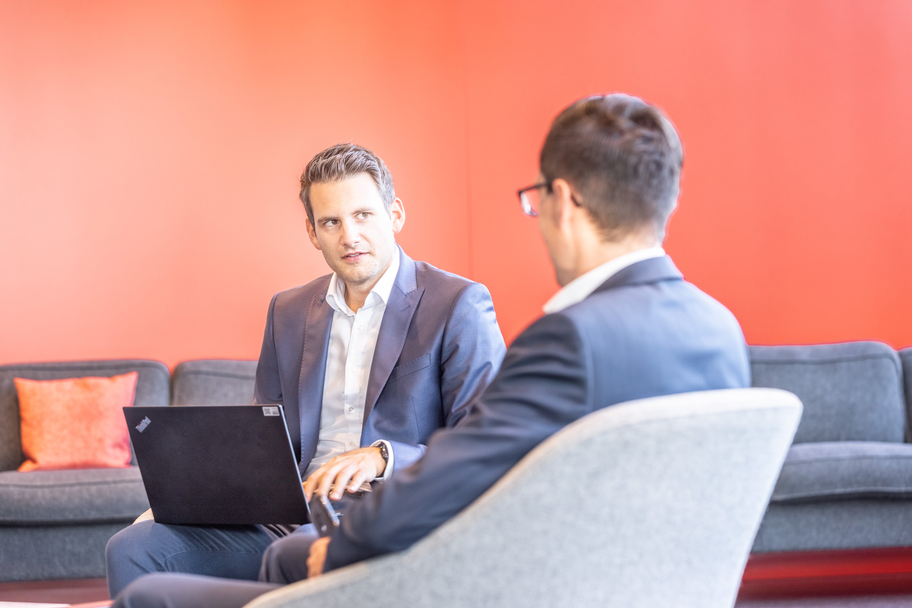 Two men talking business 